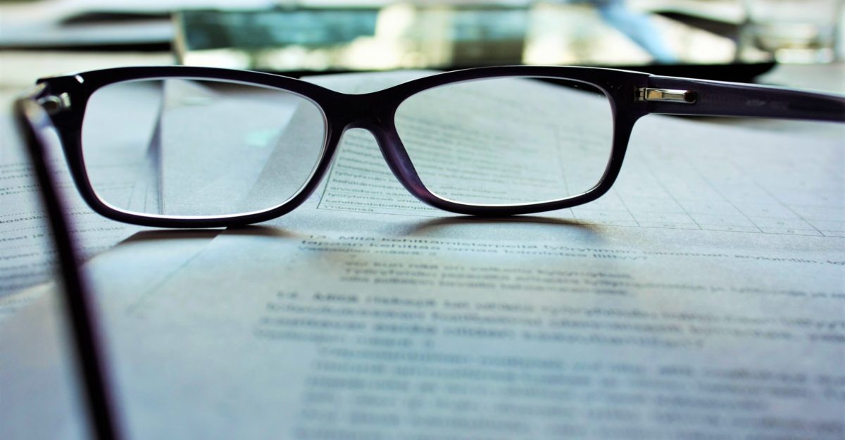 Glasses resting on contract