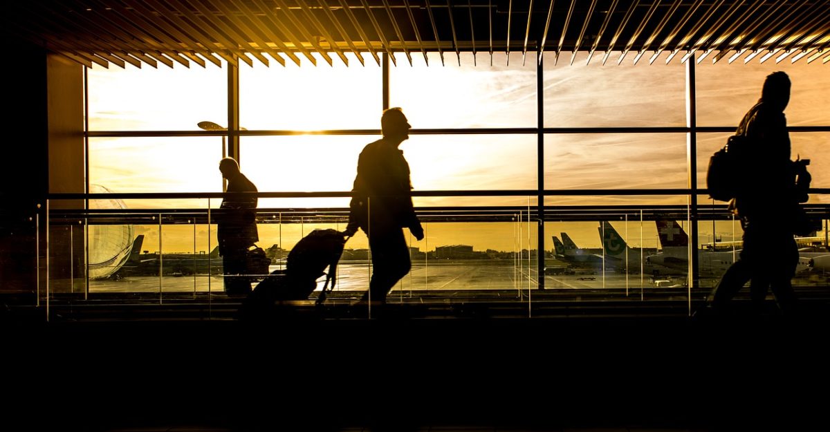 Man Walking With Luggage