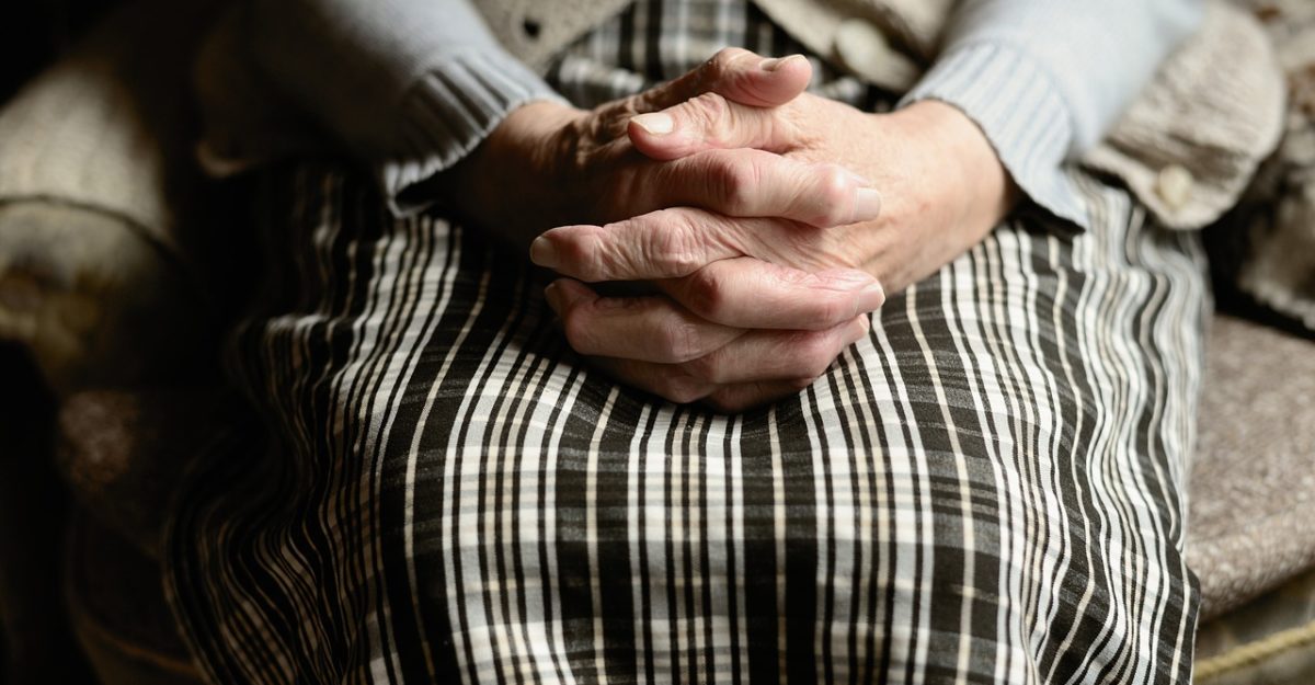 Hands Folded on Lap