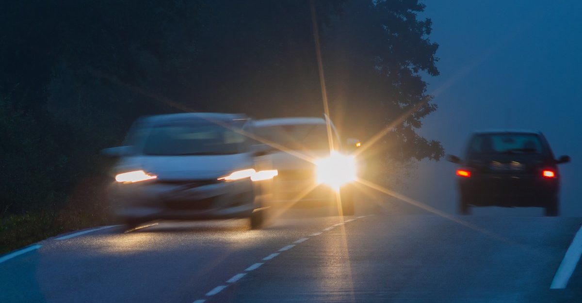 cars on road, night