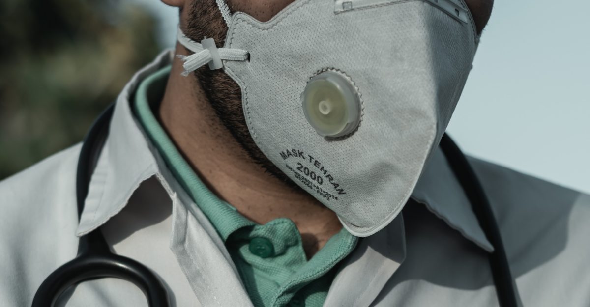 man wearing mask essential workers in Canada