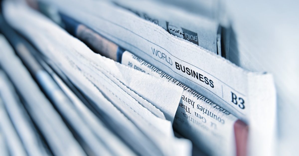A number of newspapers lined up one after the other. Metroland is laying off 605 employees as it declares bankruptcy.