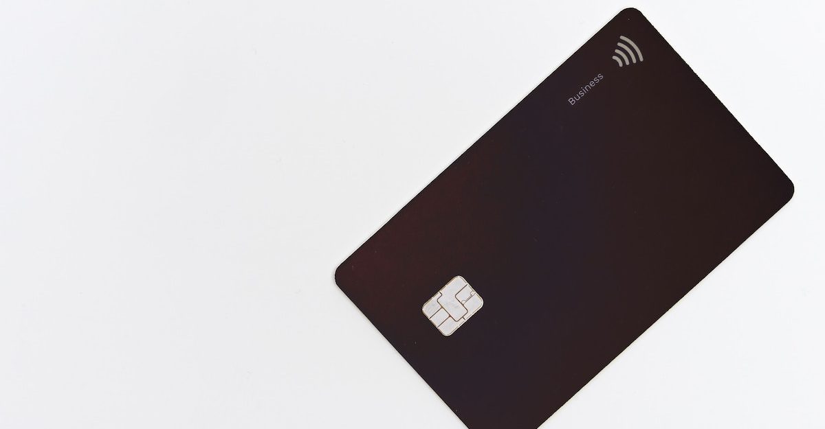 A black credit card, similar to an American Express Canada card.