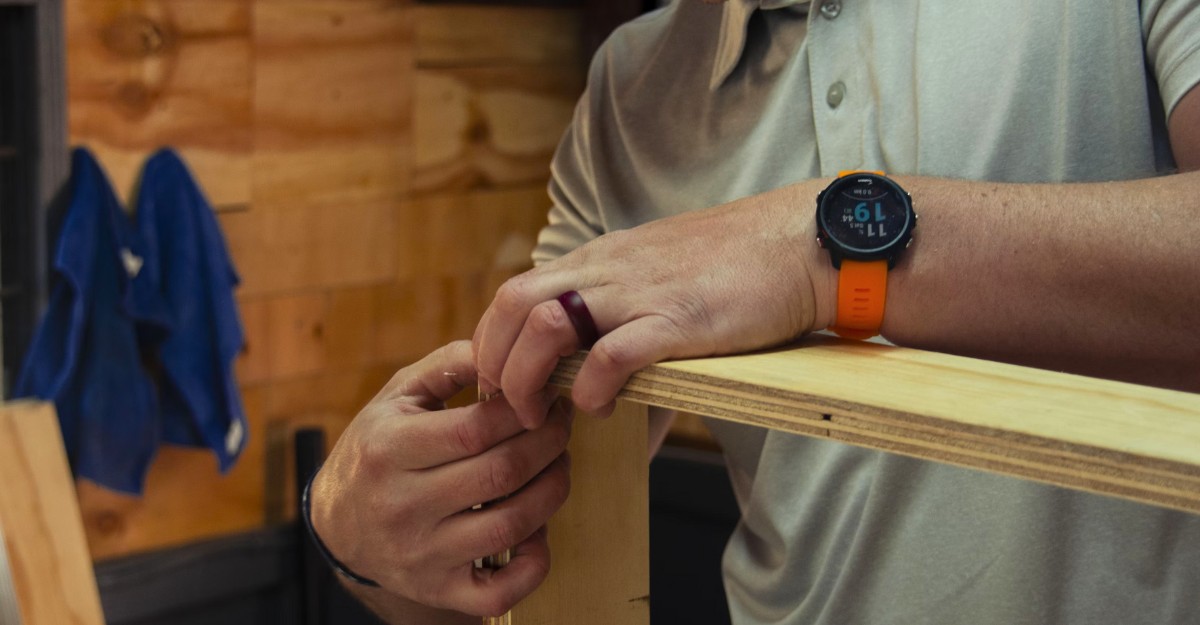 A photo of a person creating a wooden frame in a workshop. (Photo: Ryno Marais / Unsplash)
