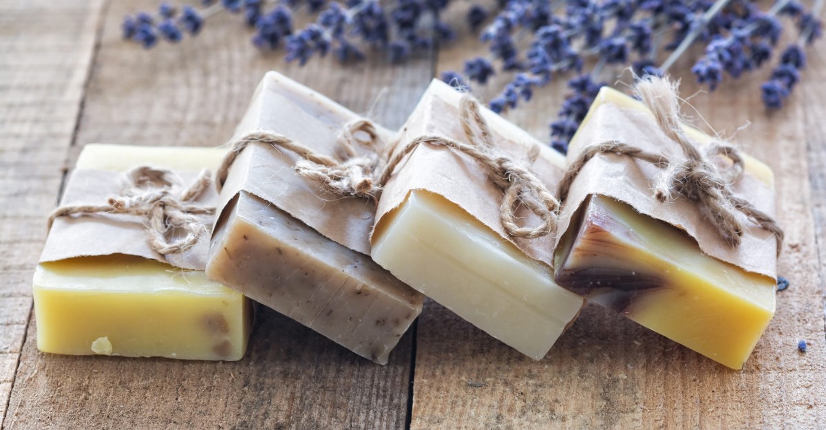A photo of various soaps on a wooden table. (Photo: Aurélia Dubois / Unsplash)