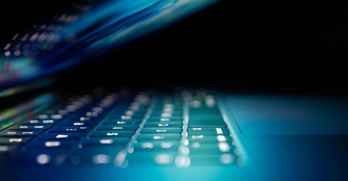 A photo of a laptop that is partially closed. (Photo: Philipp Katzenberger / Unsplash)