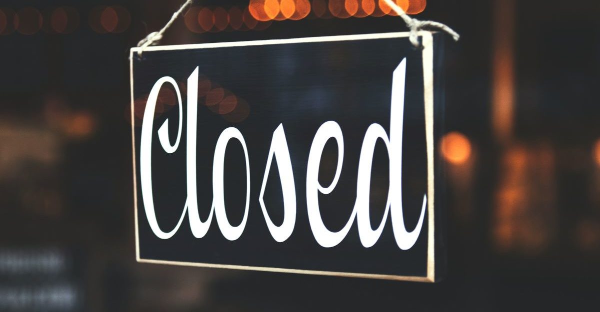 A closed sign, shown as Simmons Foods begins closing its Mississauga processing plant.
