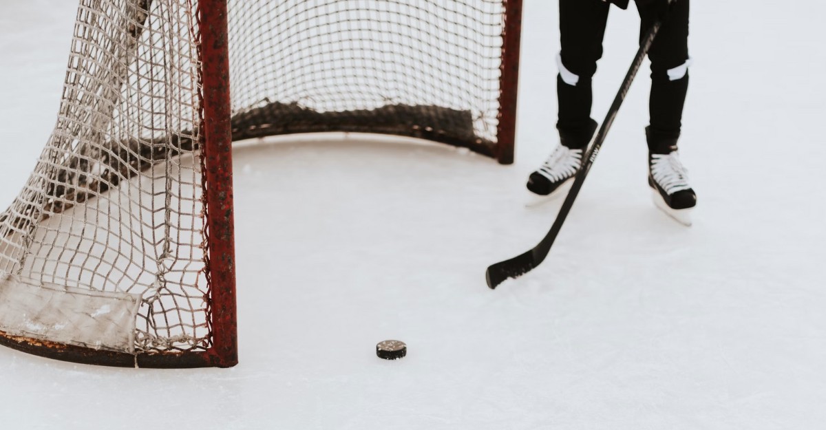 A photo of a person preparing to play some hockey. (Photo: Samantha Gades / Unsplash)