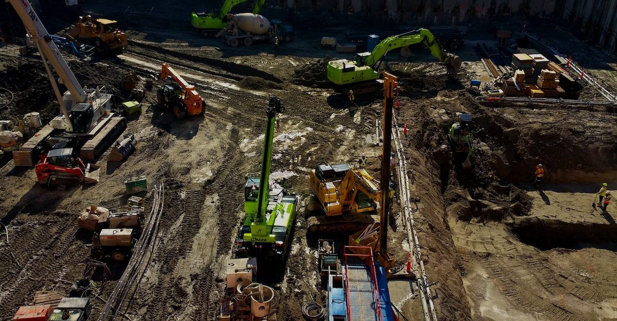 A construction site, potentially one under the direction of Magil Construction.