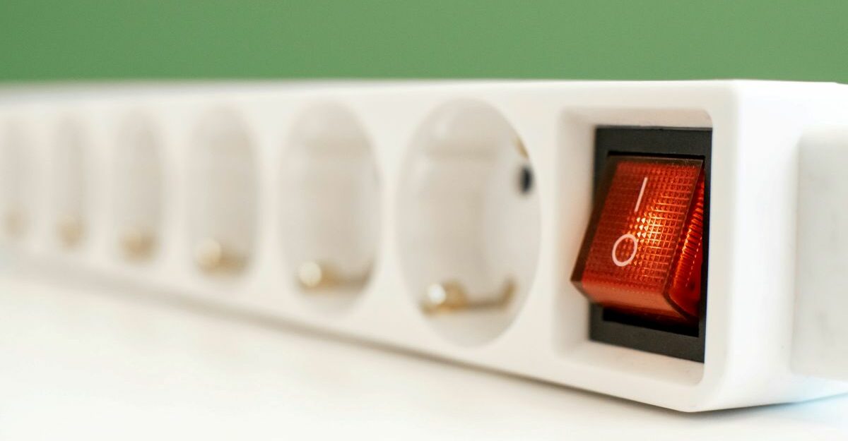 A power switch indicates that an electrical device is on and functioning.
