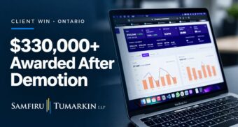 Laptop displaying marketing analytics beside “$330,000+ Awarded After Demotion” and the Samfiru Tumarkin LLP logo.