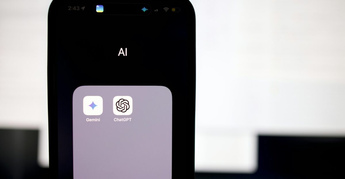 A smartphone showing the Gemini and ChatGPT apps.