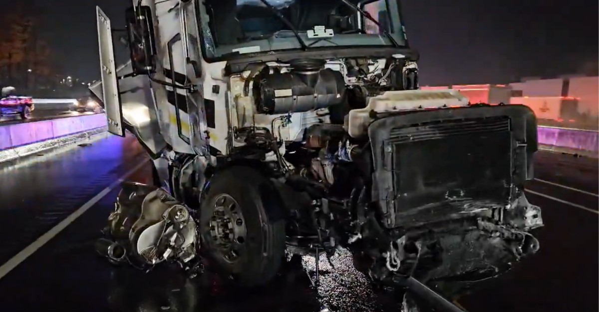 A badly damaged tractor-trailer on Highway 401 near Winston Churchill Boulevard in Mississauga. (Photo: @OPP_HSD / X/Twitter)