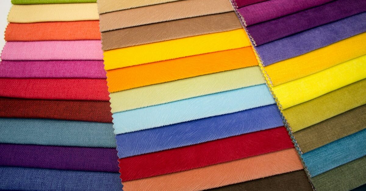 Dozens of swaths of colourful fabrics and materials.