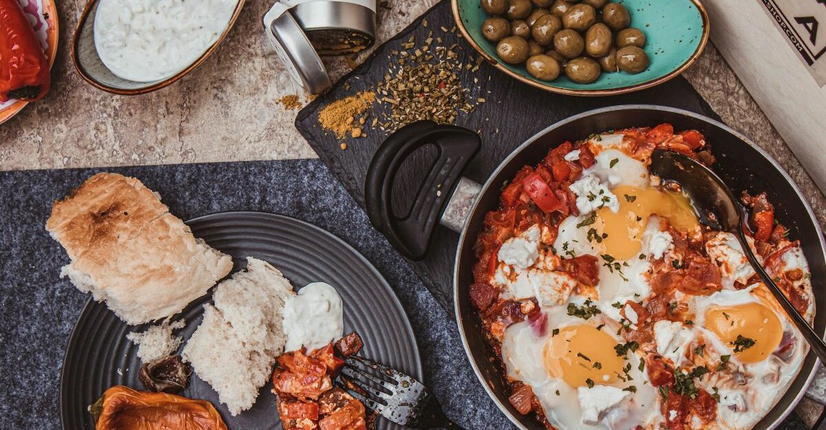 An assortment of delicious greek food is on display.