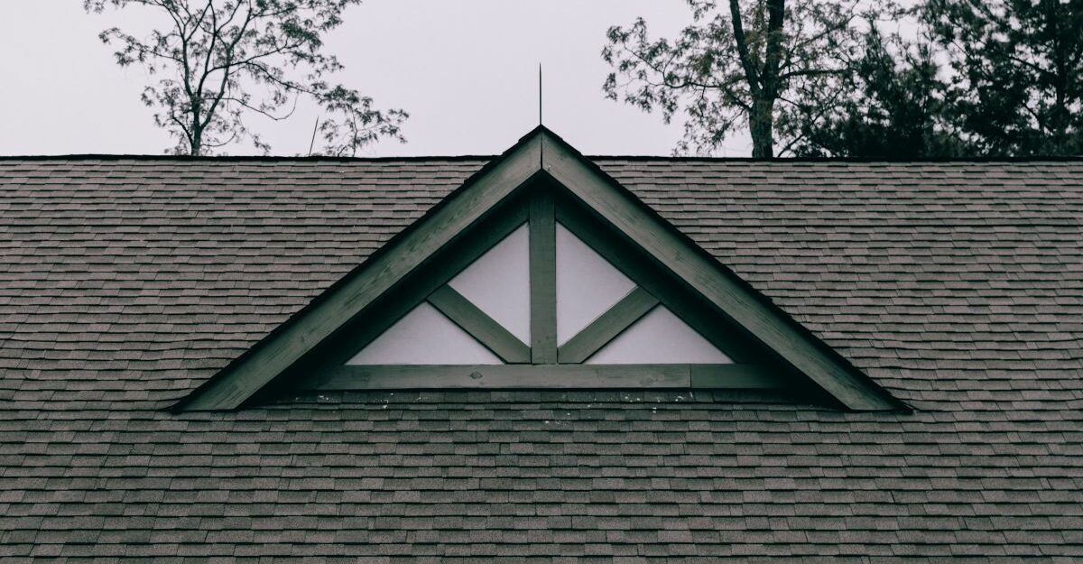 New shingles are seen on a sprawling roof.
